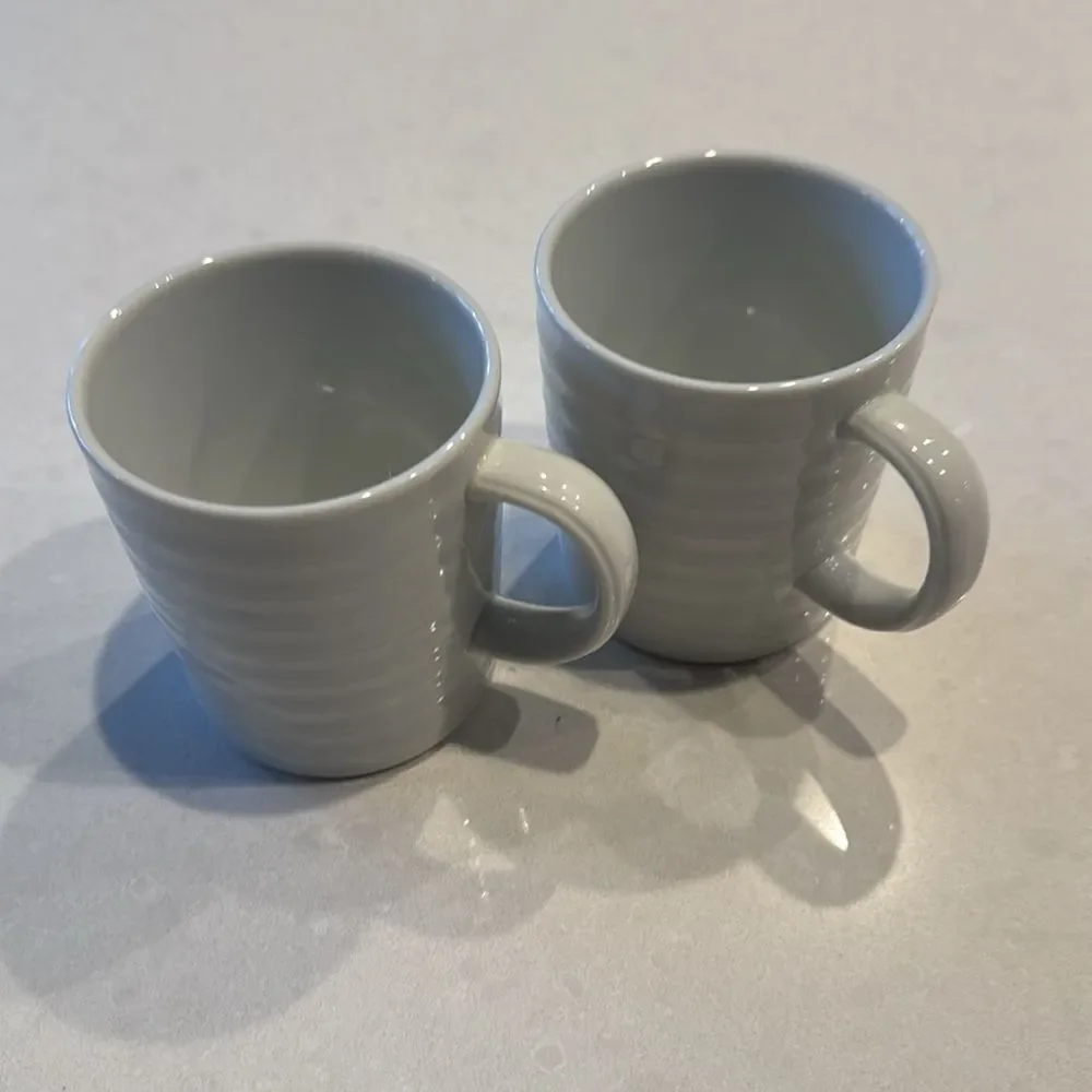 Crate & barrel roulette white 2 coffee cups, excellent condition.